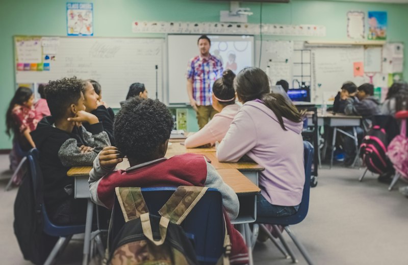 Teacher leading a classroom lesson