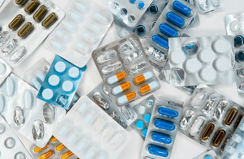 Assorted tablets and capsules in blister packs
